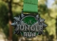 Medalhas de bronze das concessões da corrida da selva da estampagem do festival