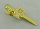 A aderência de bronze do botão de punho relativo à promoção da barra de laço dos homens do ouro morre perto carimbado
