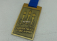 As medalhas personalizadas da maratona do ouro 3D, morrem as medalhas do esporte da carcaça, medalhas do esmalte da fita com liga de zinco